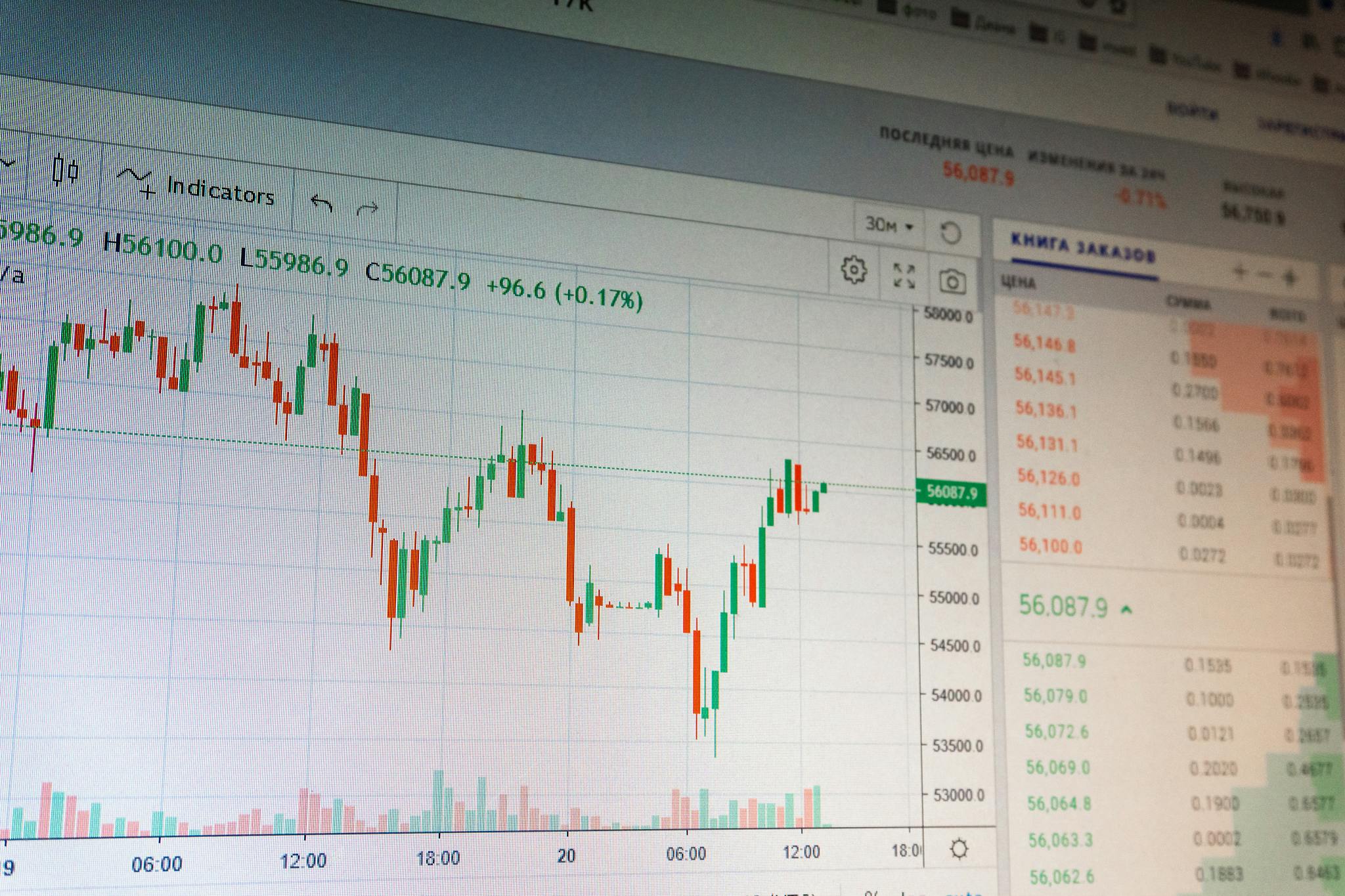 Close-up of digital cryptocurrency market graph showing price fluctuations and trading data.
